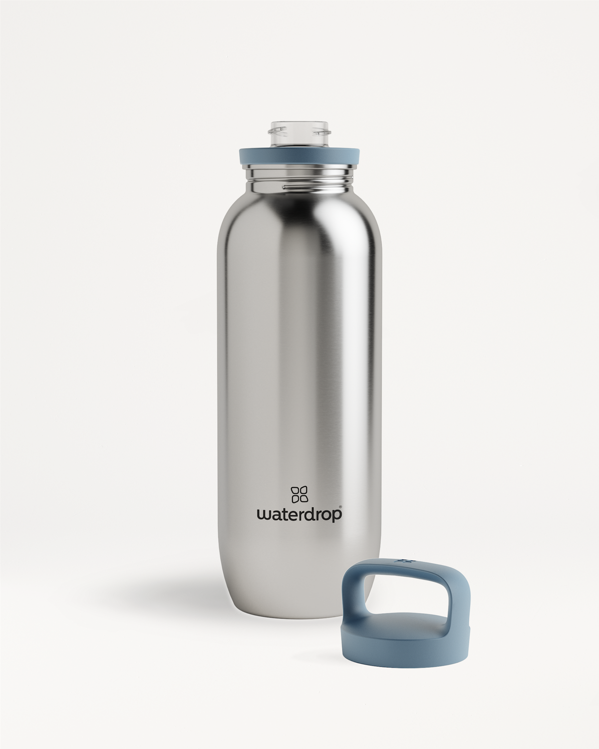 All-Purpose Sport Ultralight · Spout Lid, silberne Flasche mit blauem Deckel.