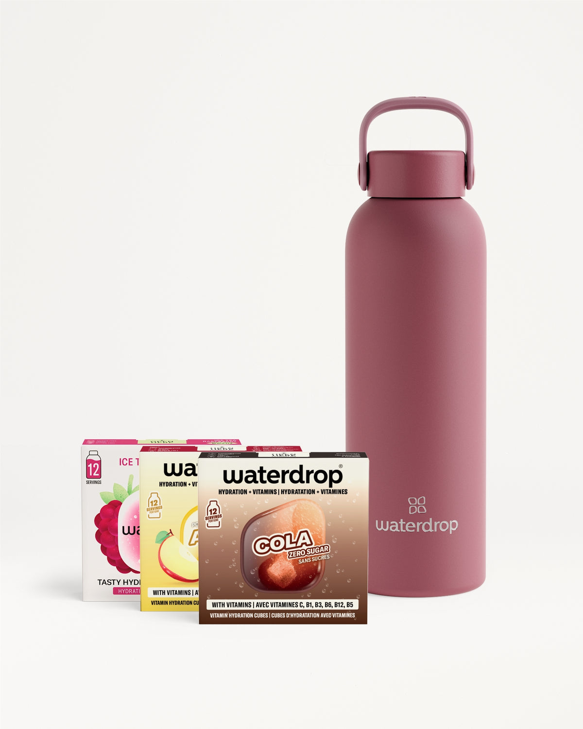 Rosa wiederverwendbare Wasserflasche mit Henkel neben einer Sorte Getränkemischungen.