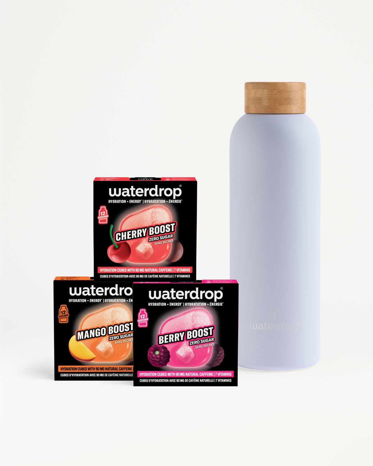 Verschiedene Waterdrop-Boxen gestapelt neben einer hohen hell-lila Flasche mit Korkdeckel.