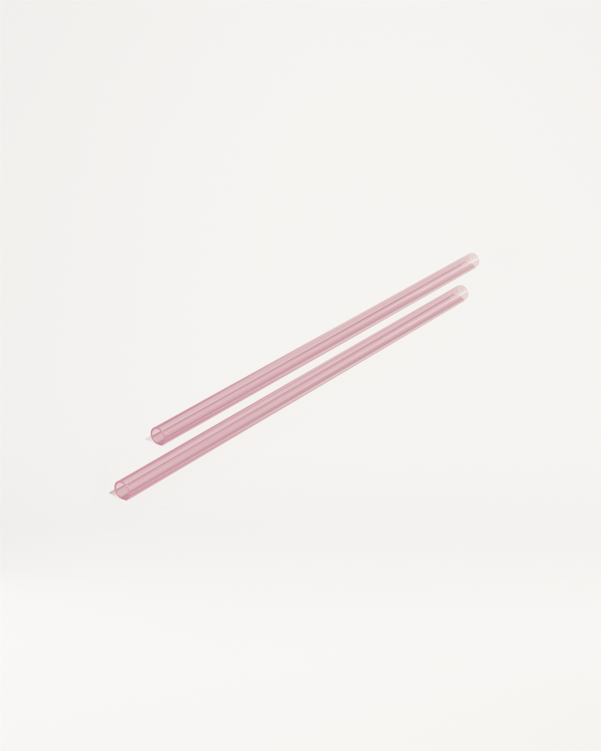 Goodie auswählen: Zwei rosa Trinkhalme nebeneinander auf weißem Hintergrund.