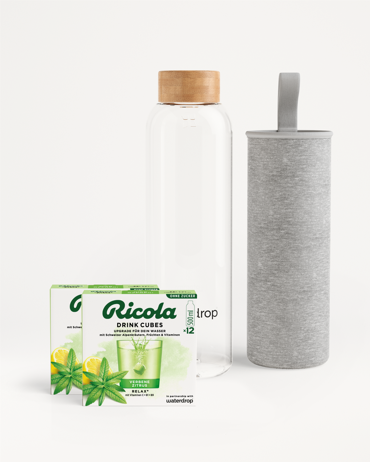 Ricola Bottle Set: Drink Cubes und Glasflasche für Erfrischung.