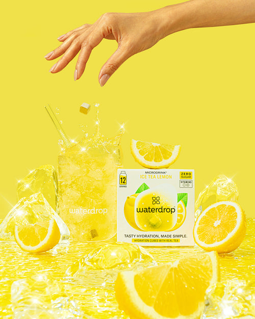 Deluxe Starter Set mit Ice Tea Lemon Microdrink und Zitronenscheiben.