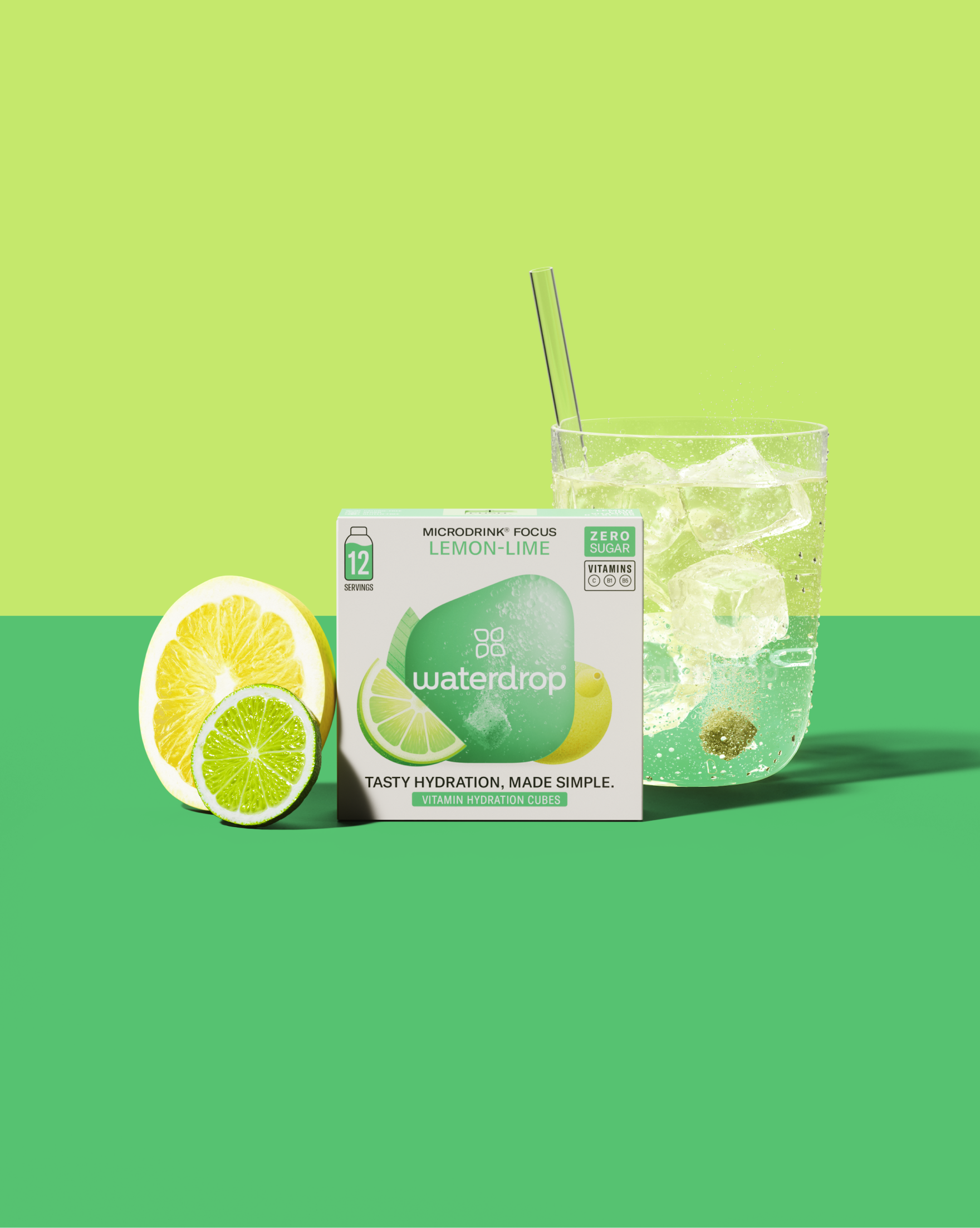 ZITRONE-LIMETTE Twin Pack mit Vitaminwürfeln und Glas Wasser.