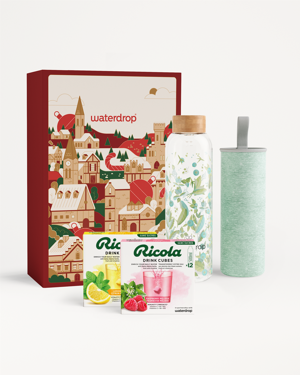 Ricola Glass Geschenkset mit Flasche und Ricola Drink Cubes.