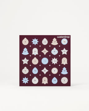 Adventskalender mit 24 nummerierten Türchen in einem dunkelvioletten Quadrat vor hellem Hintergrund.
