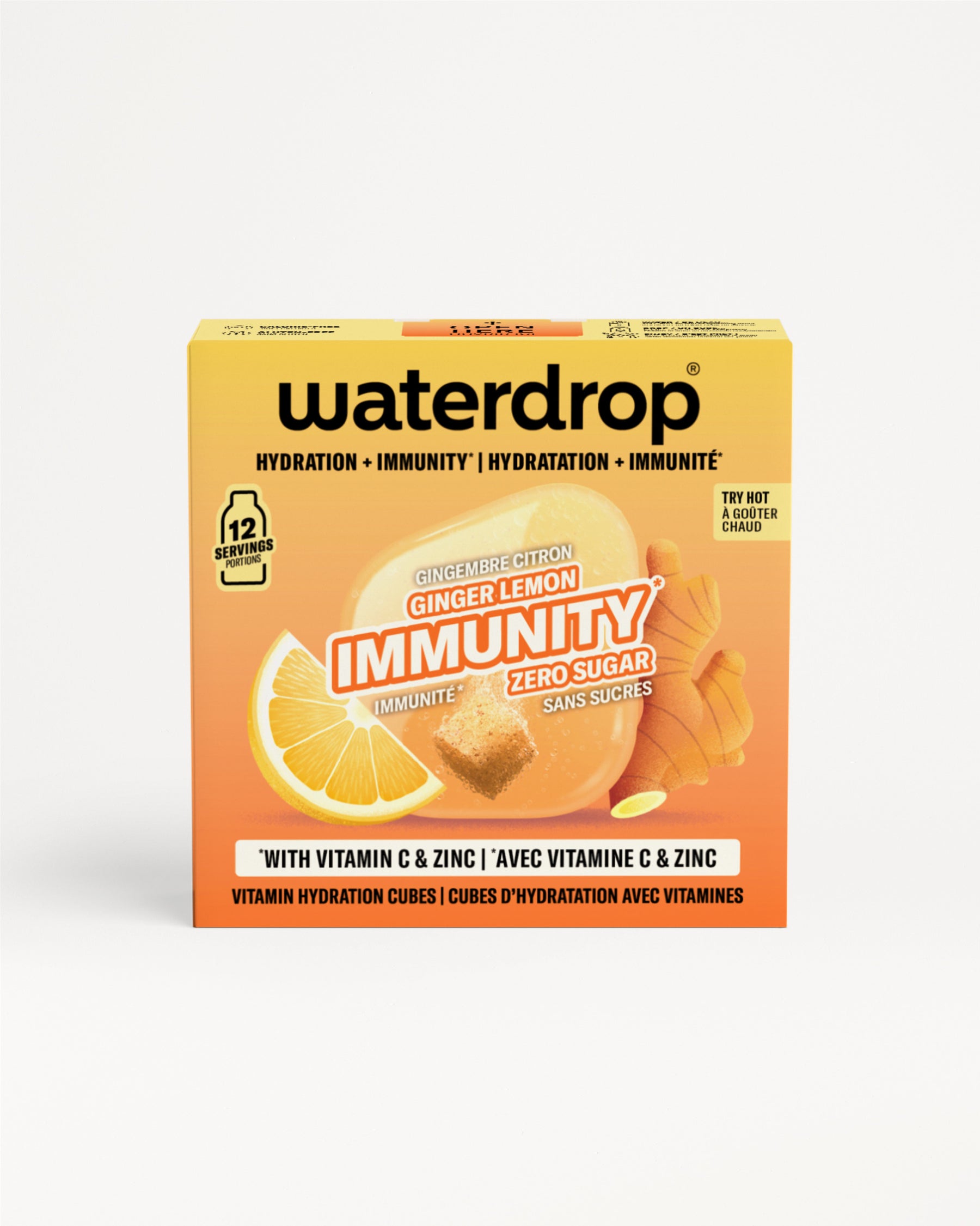 Orangefarbene Waterdrop-Immunbox mit Zitrone und Ingwer Abbildung.