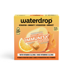 Orangegelb gestaltete Waterdrop Immunitätswürfel-Verpackung mit Zitrusgrafik.