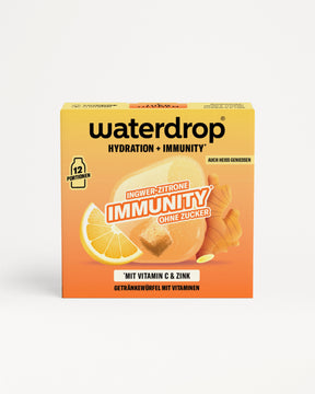 Gelb-orangefarbene Waterdrop Immunity Verpackung mit Zitronenscheibe Grafik.