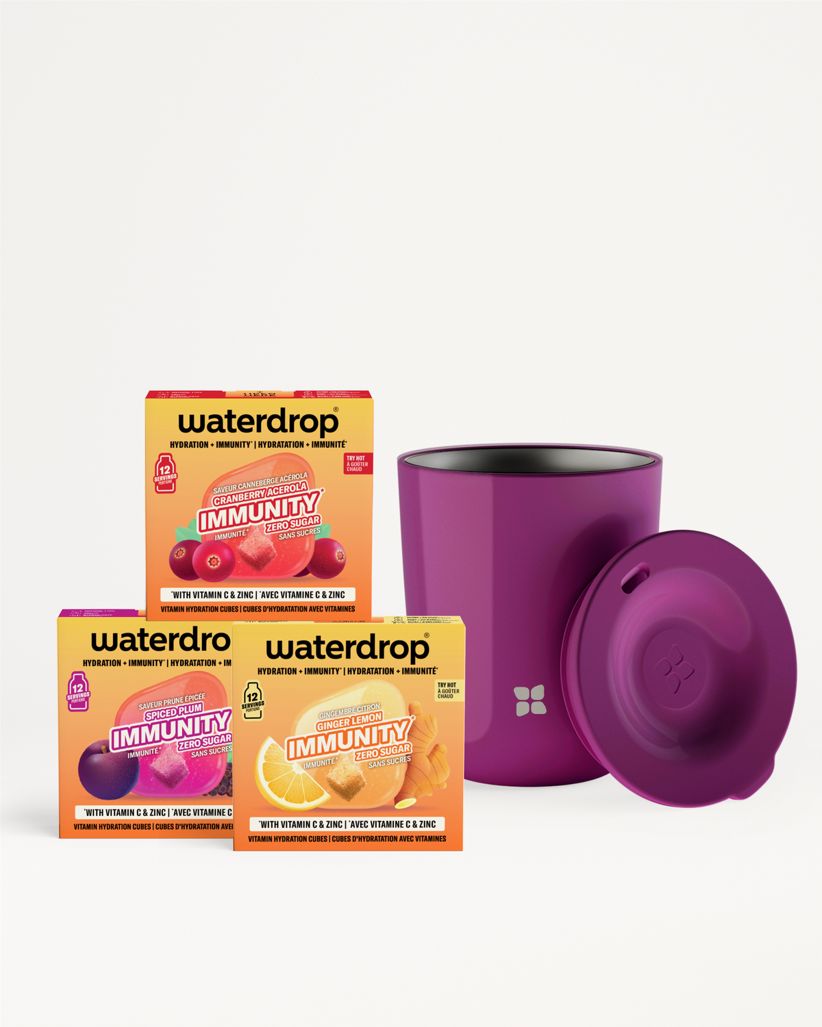 Drei Waterdrop Immunity-Boxen mit lila isolierter Tasse und Deckel.