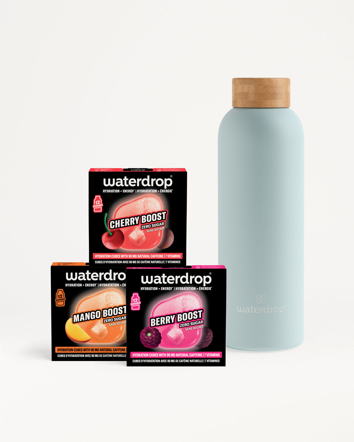 Bunte Waterdrop-Verpackungen und eine hellblaue Flasche mit Holzkorken.
